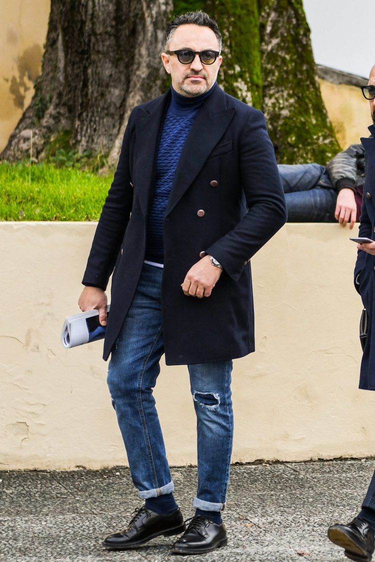 Damaged jeans as a beautiful casual accent