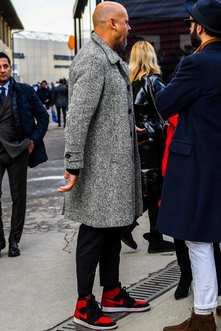 Mixing classic and sport with black pants