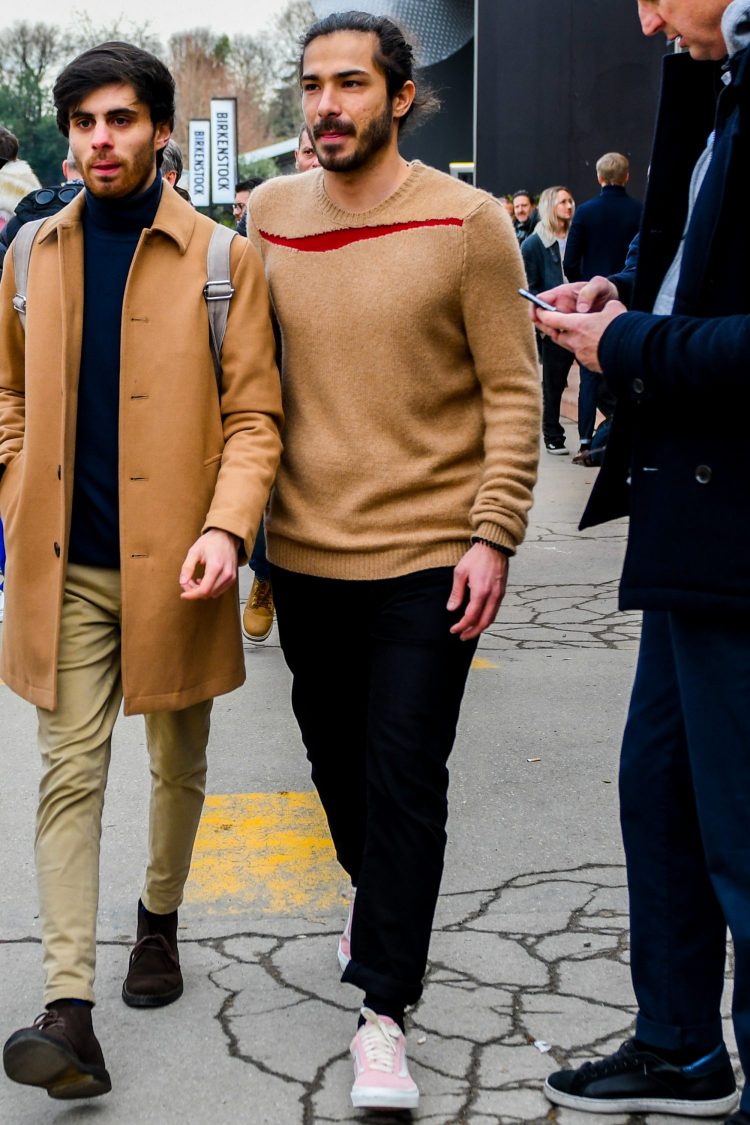 Cordinate black pants to accentuate the presence of the top and sneakers.