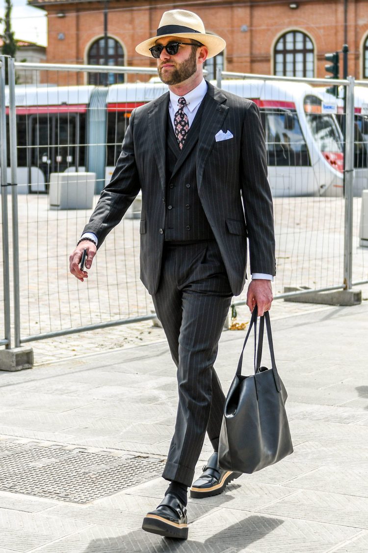 Gray striped suit style with a three-piece classic look and street style on the feet