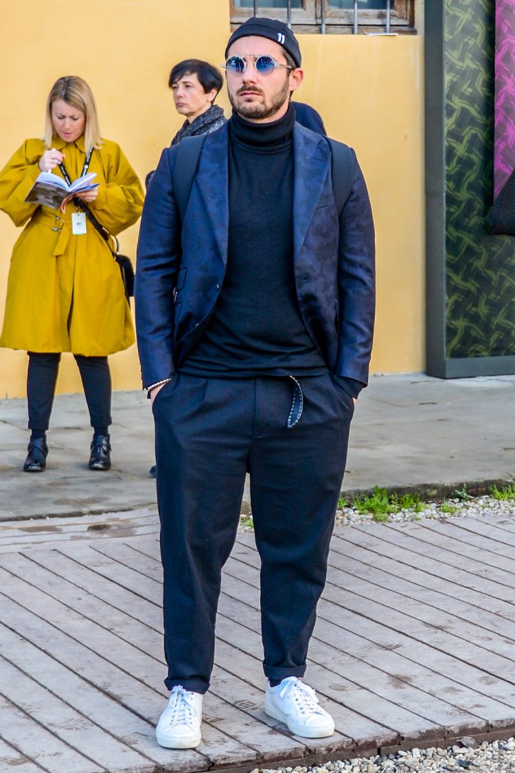 Navy tone-on-tone style coordinated with navy pleated pants