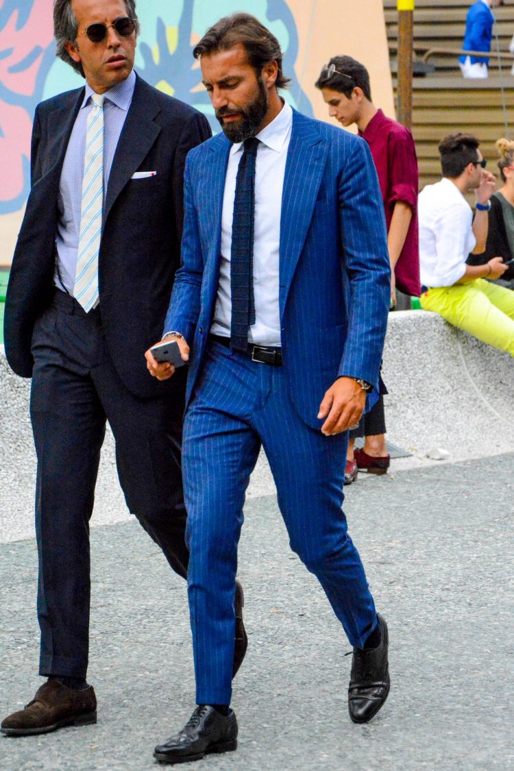 Bright blue striped suit that accentuates the clean silhouette