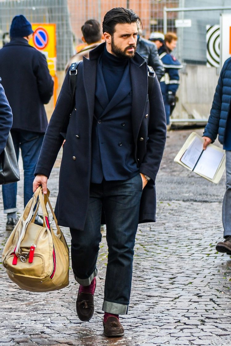 Brown suede tassel loafers complemented by a navy tone-on-tone style