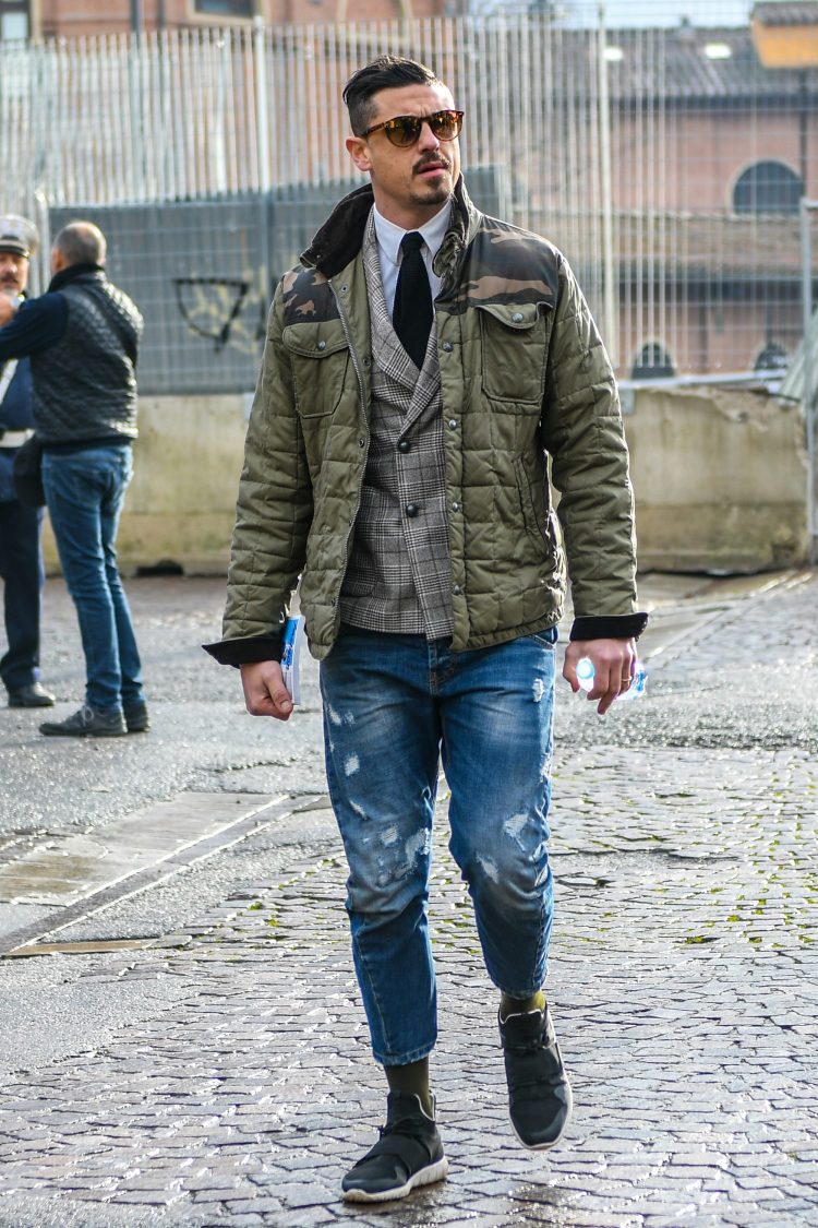 Military and dress mixed with damaged jeans