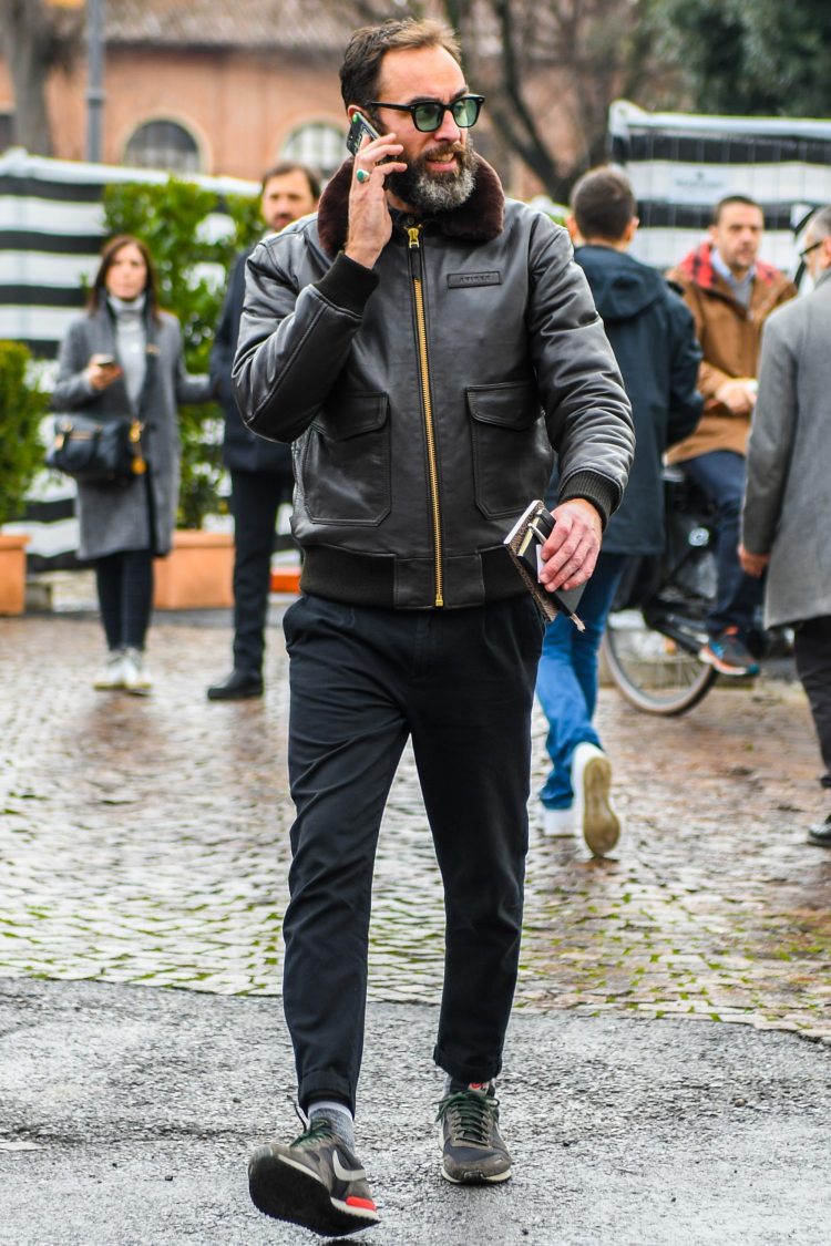 Black boa jacket with a lean silhouette that avoids a plain look