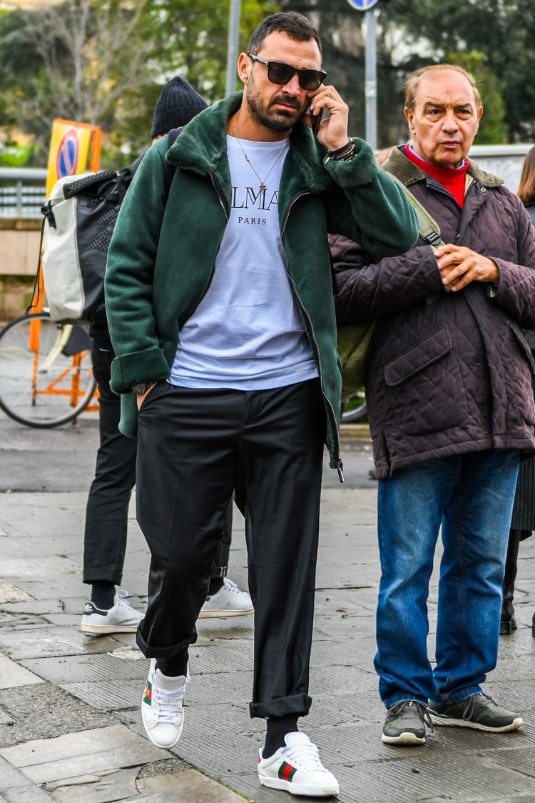 Luxurious street style coordinated with a shiny green mouton boa jacket