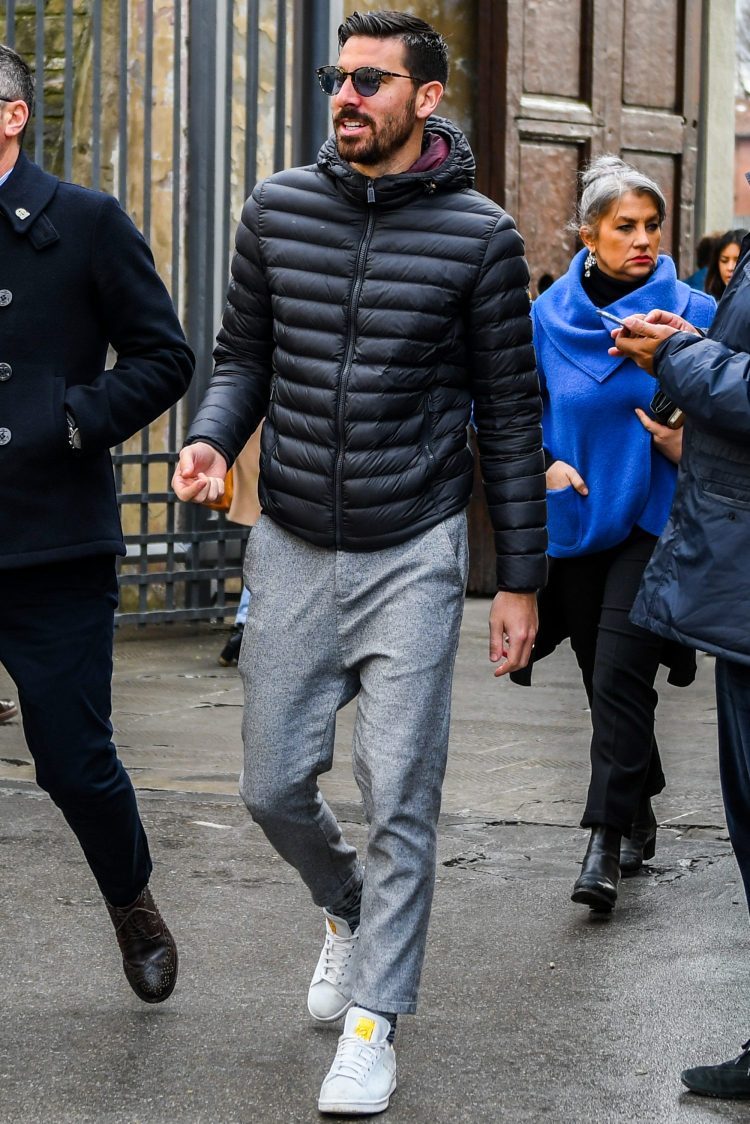 Trousers with a looser waist silhouette and Stan Smiths for an effortless look