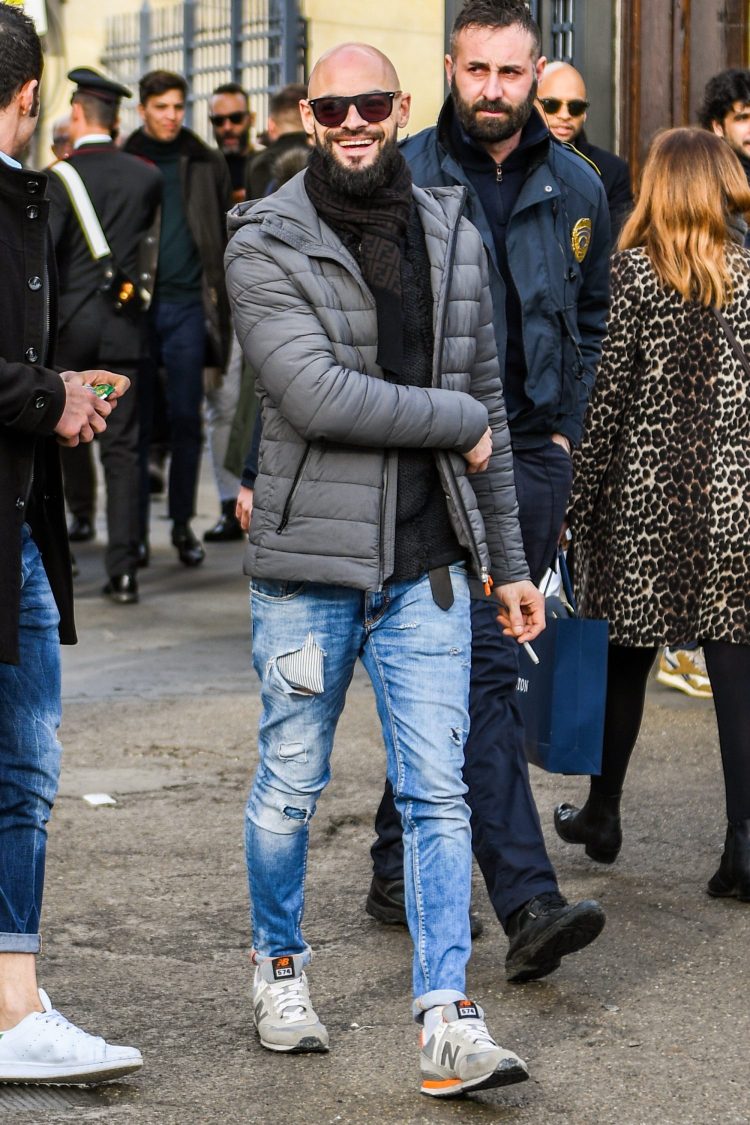 Offset the overkill of damaged jeans with a chic upper body.