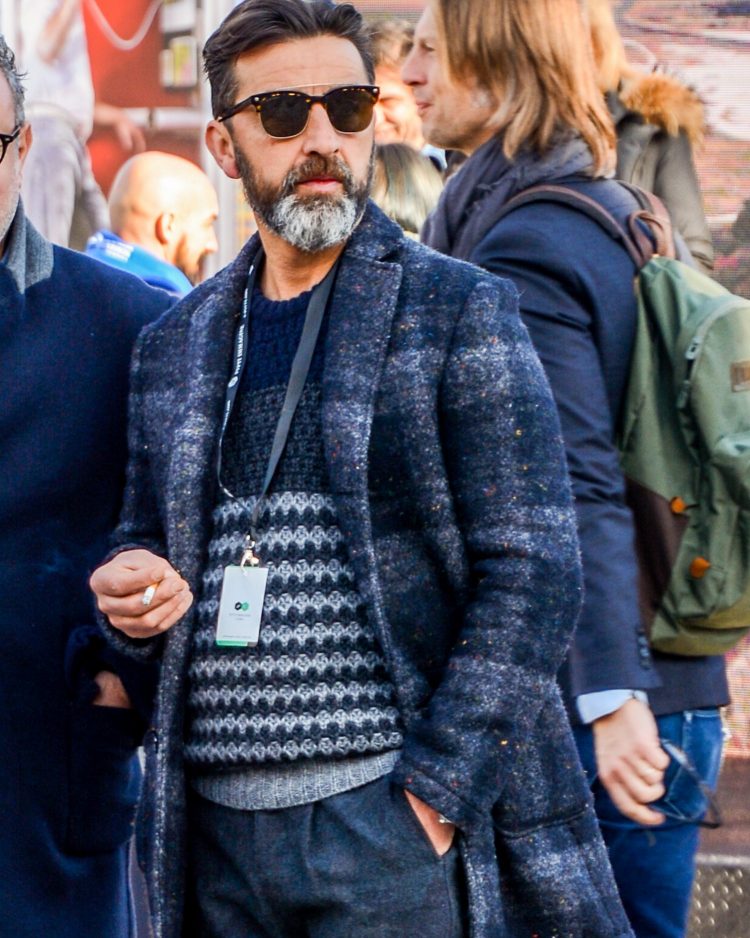 Coordinating thermont sunglasses synchronized with the chic glamour of the outfit.