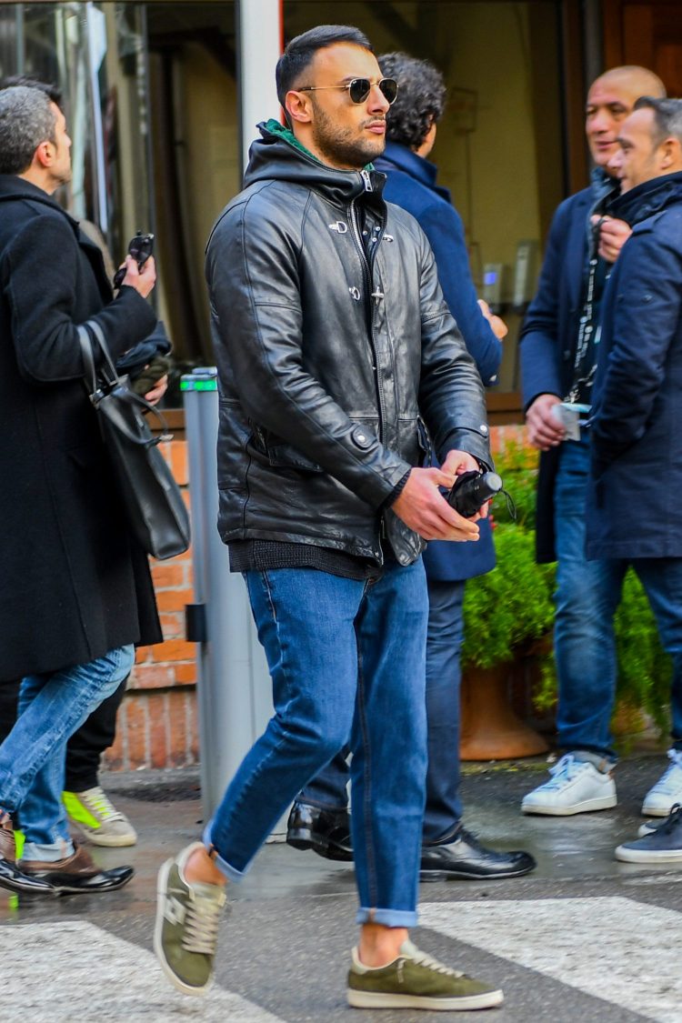 Create a masculine and rugged look with a leather hooded coat