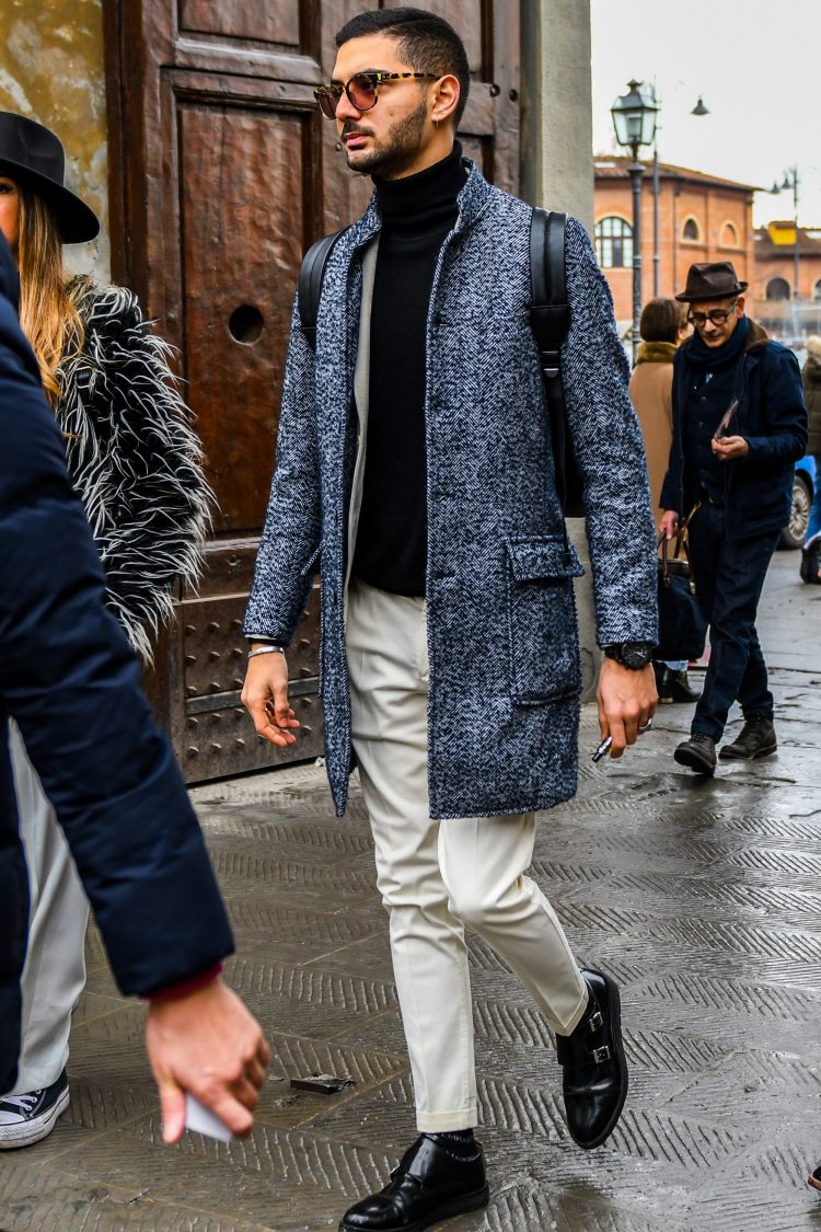 Men's coordinate with black turtleneck knit pulls the entire outfit together.
