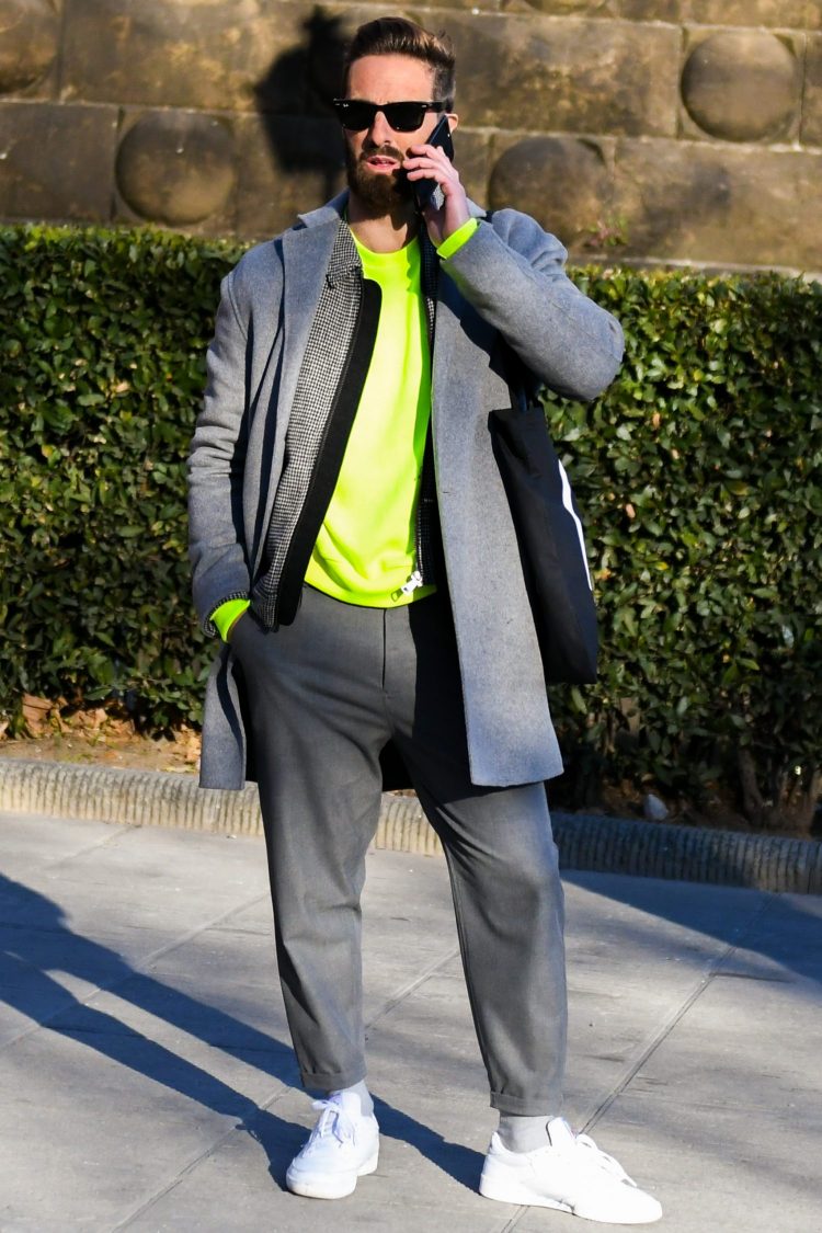 Fluorescent innerwear adds a touch of cyber to the gray coat coordinate.