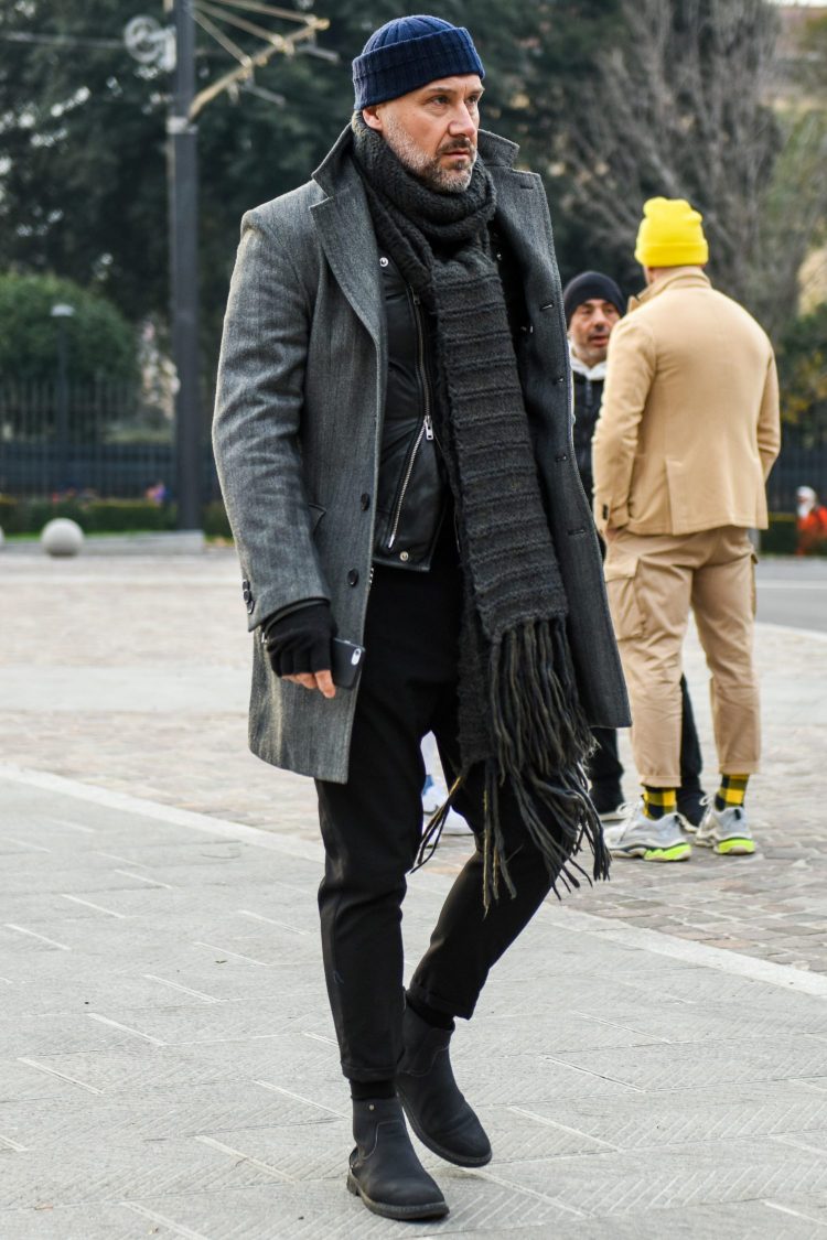 A cozy layered gray coat coordinate with a black rider's inner lining for a rugged nuance