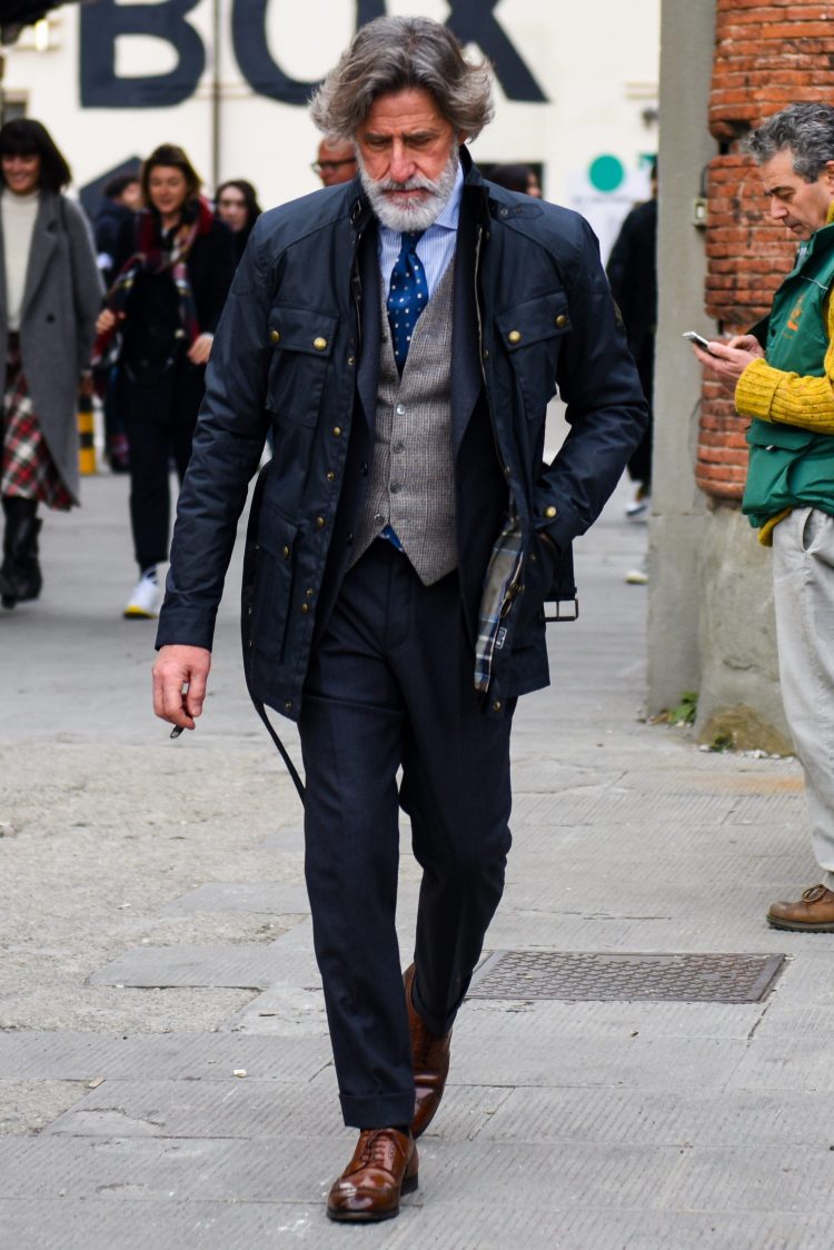 Navy suit with a rugged biker jacket