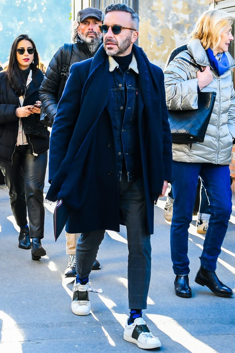 Clever style mixing gives the navy coat coordinate a cozy look.
