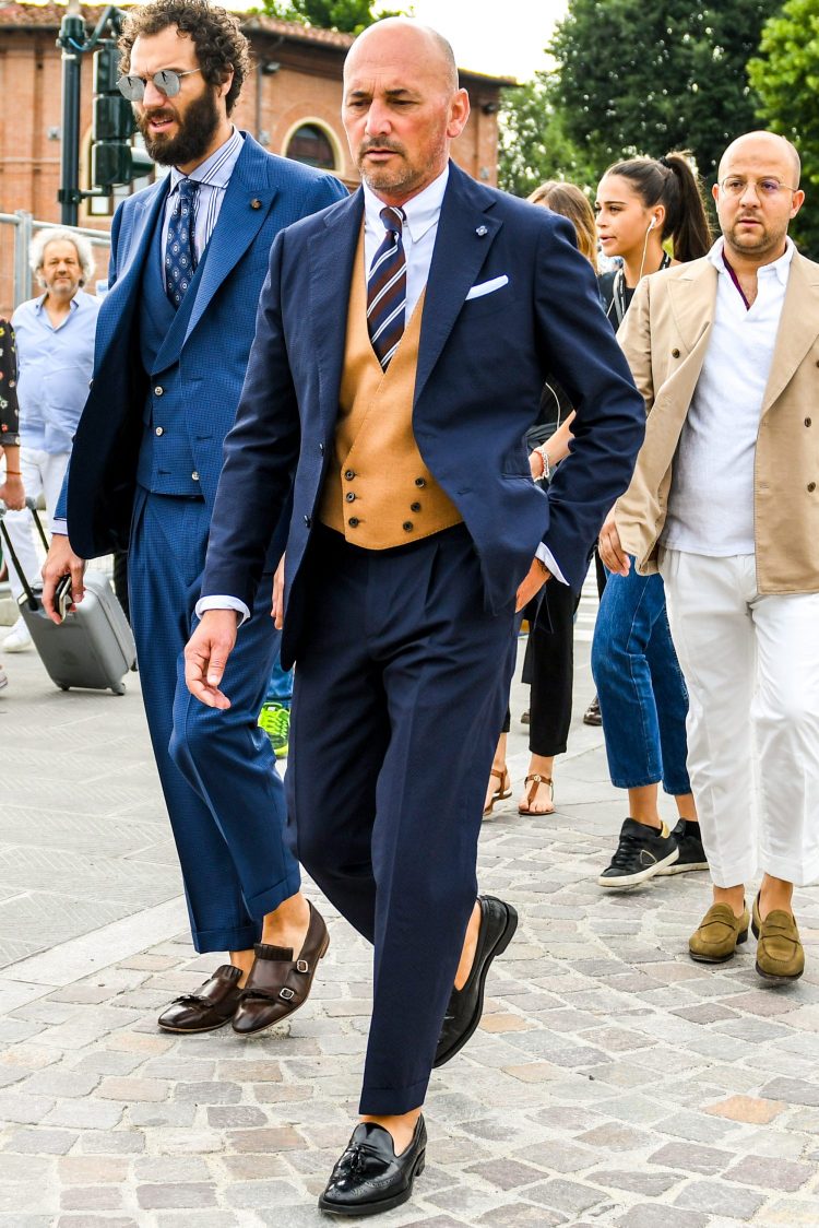 Sometimes, an odd gilet is added to give a navy suit coordinate a unique look.