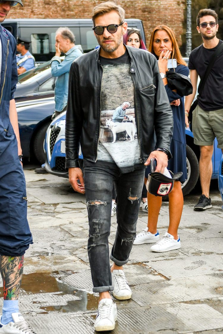 Create an aggressive look with damaged black denim