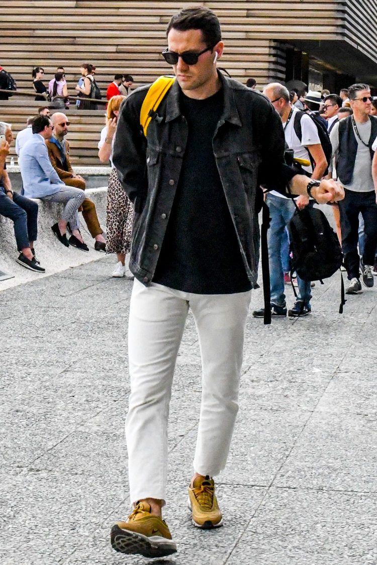 Denim-on-denim coordinate with ankle-length, slim-fit white jeans for a clean look