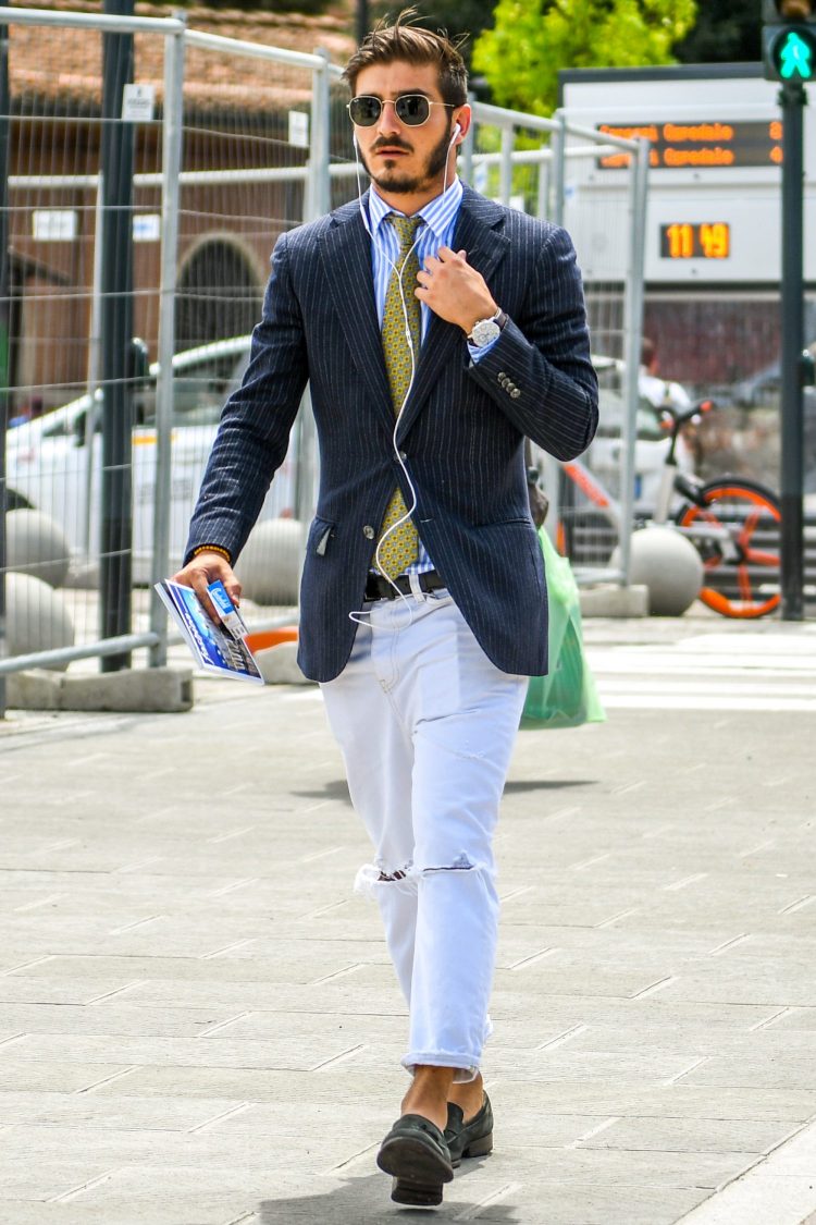 Wearing ripped white jeans for a fresh, new jacket-style look.