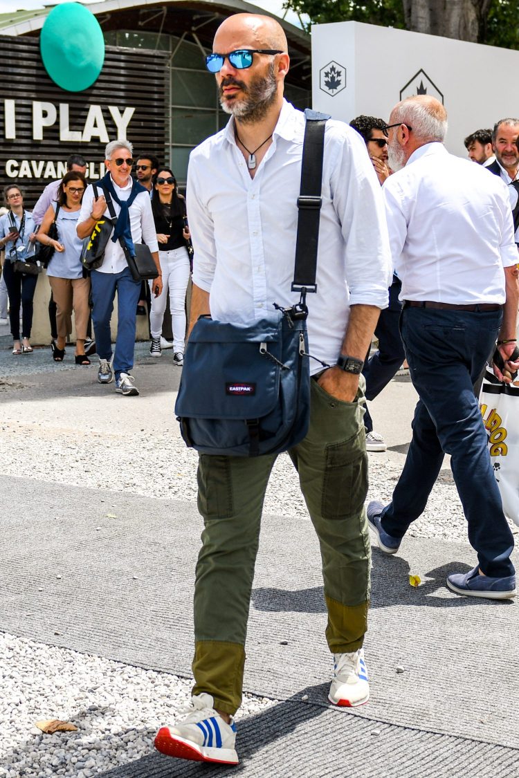 Patchwork khaki pants add just the right amount of accoutrements to a simple spring/summer white shirt coordinate.