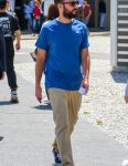 Men's sneaker coordinate with blue T-shirt, chinos, and Vans Authentic