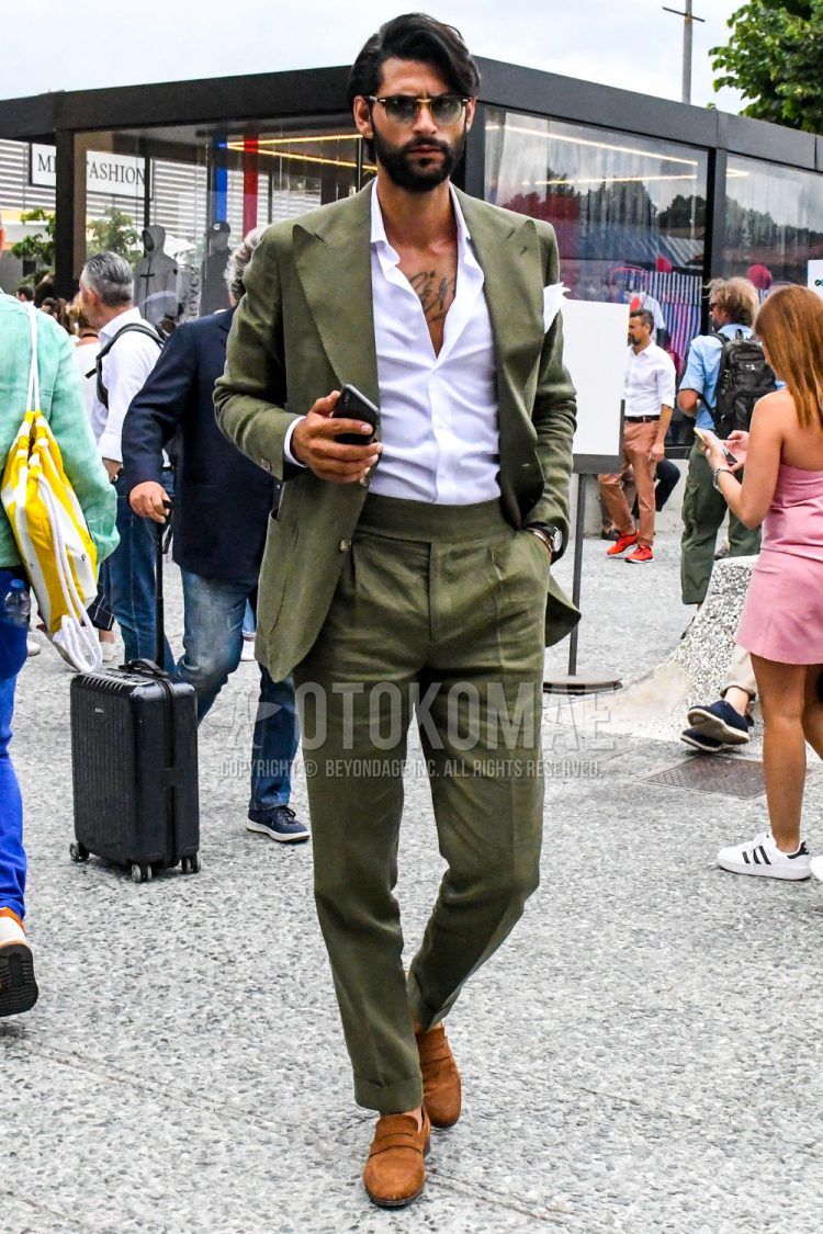A summer-spring-fall men's coordinate outfit with plain sunglasses, a plain white shirt, brown coin loafer leather shoes, and a plain olive green suit.