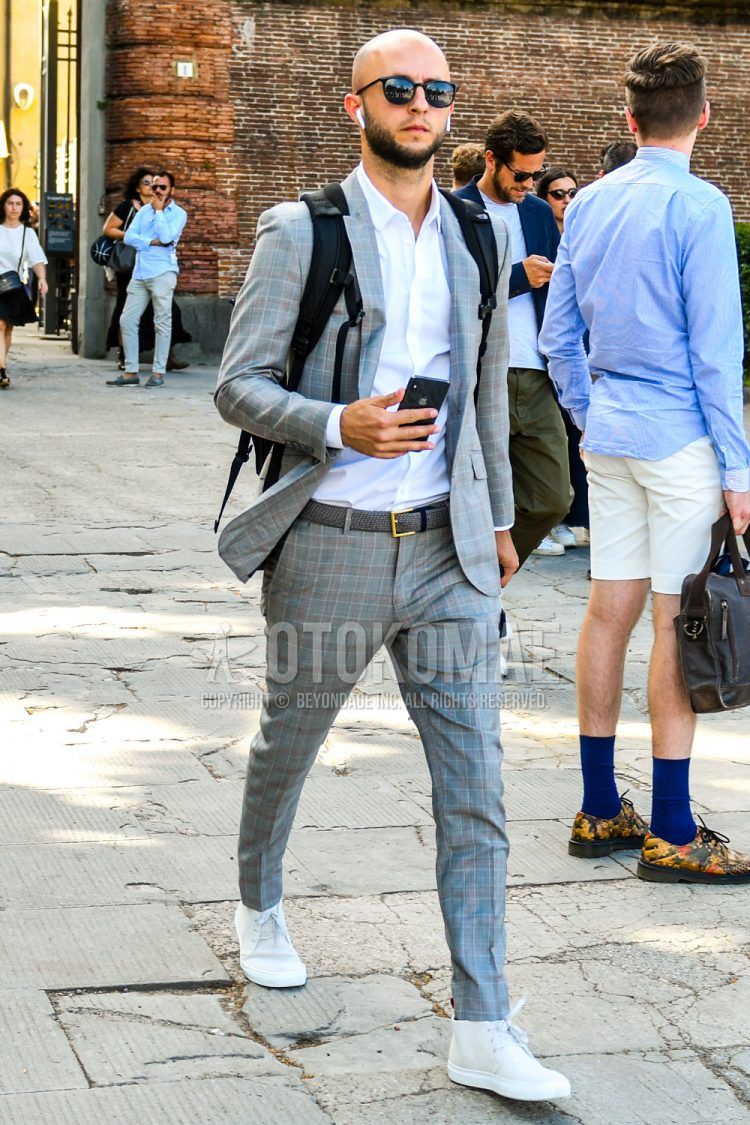 A summer/fall/spring men's coordinate outfit with plain sunglasses, plain white shirt, plain gray mesh belt, white high-cut sneakers, and gray checked suit.