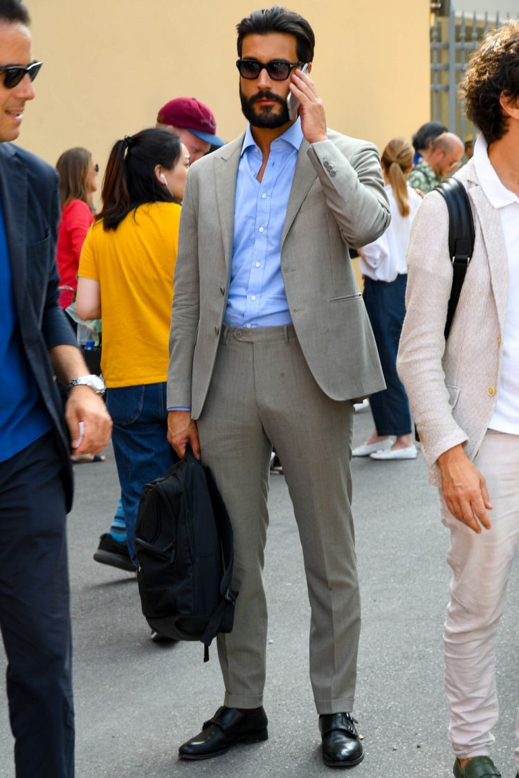 Men's coordinate outfit with suit and backpack