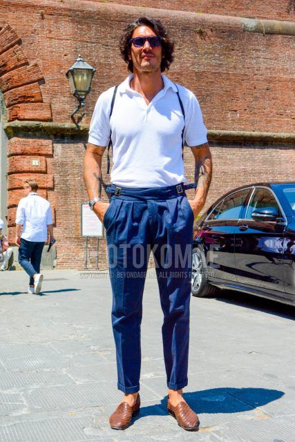 Summer men's coordinate outfit with plain sunglasses, plain white polo shirt, plain navy beltless pants, plain pleated pants, plain slacks, and brown other loafer leather shoes.