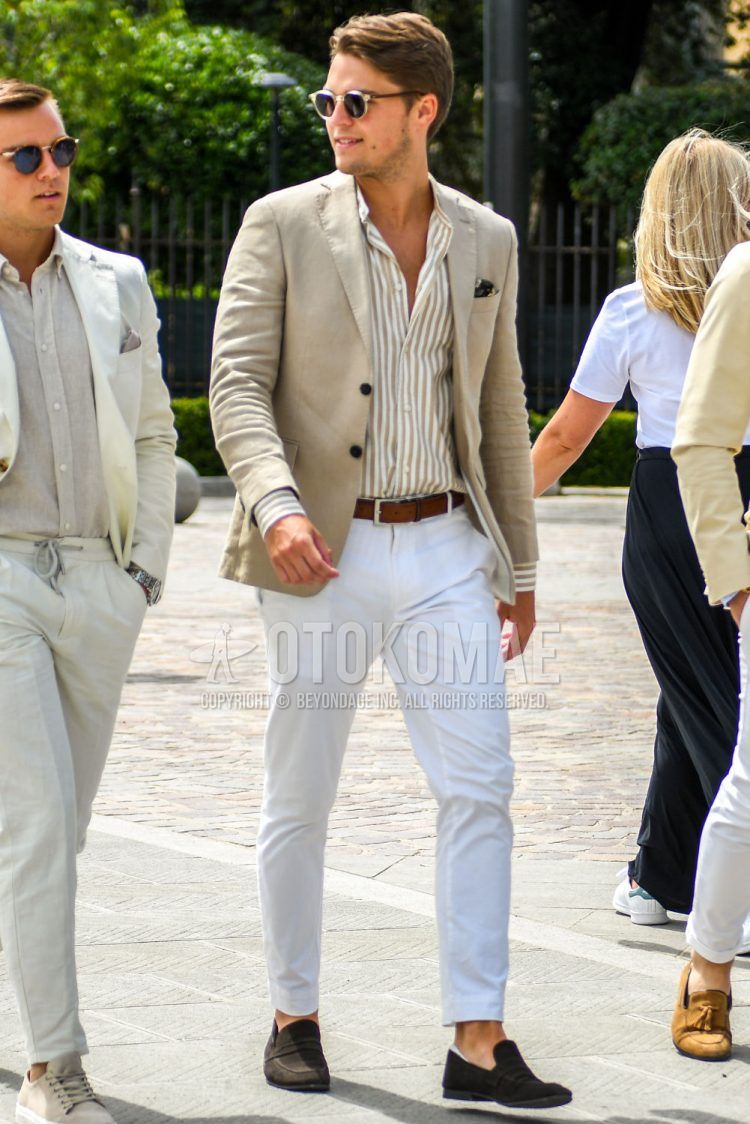 Spring, summer and fall men's coordinate outfit with plain sunglasses, plain beige tailored jacket, beige/white striped shirt, plain brown leather belt, plain white ankle pants, brown suede shoes leather shoes, brown coin loafers leather shoes.