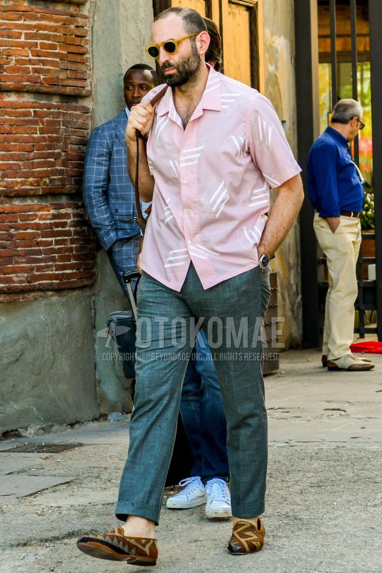 Summer men's coordinate outfit with plain sunglasses, pink or other shirt, plain gray slacks, brown or other loafer leather shoes.