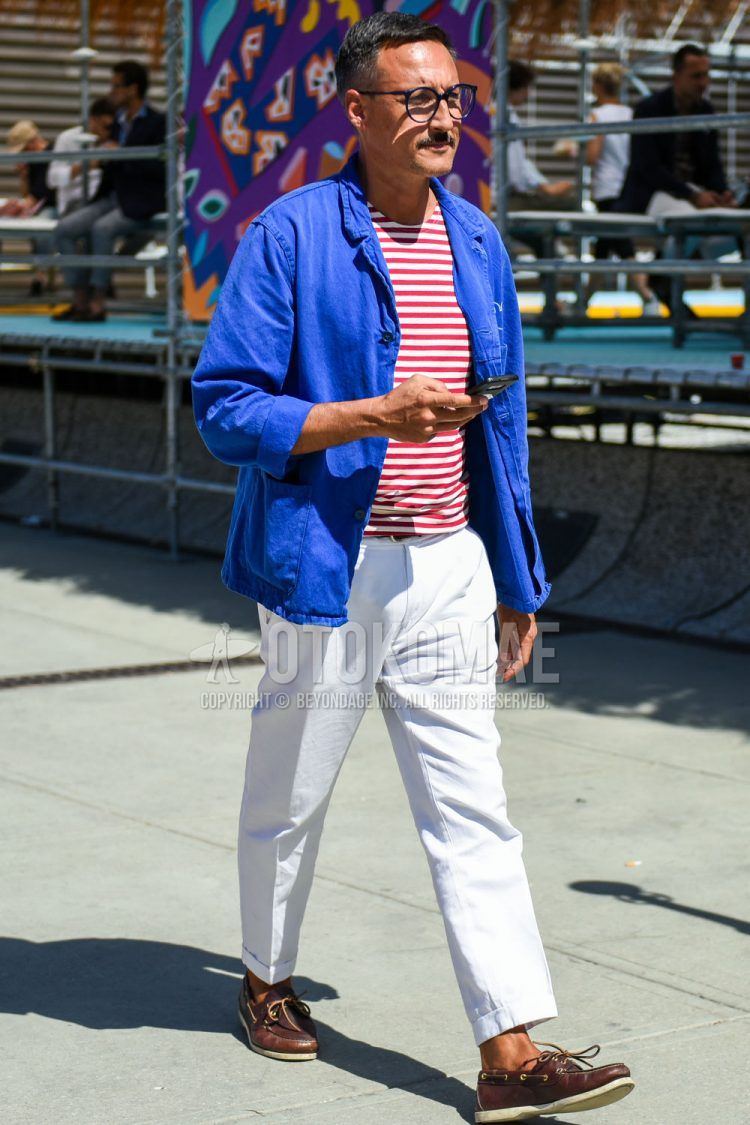 A spring/summer/fall men's coordinate outfit with plain blue glasses, plain blue tailored jacket, white/red striped t-shirt, plain white cotton pants, and brown moccasin/deck shoe leather shoes.