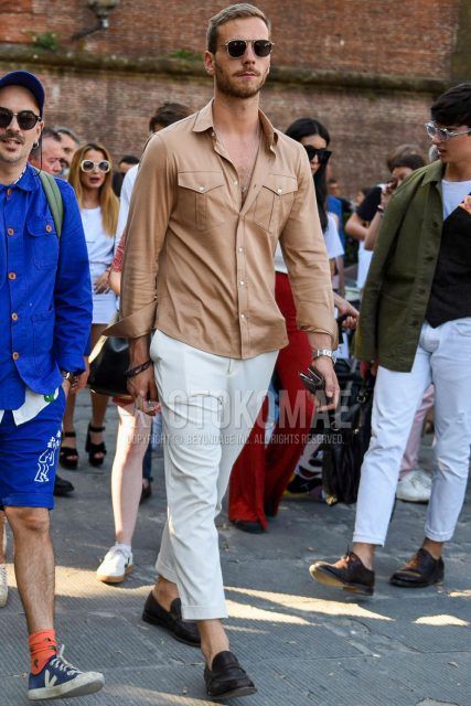 Spring and summer men's coordinate outfit with plain black/silver sunglasses, plain beige shirt, plain white slacks, and brown coin loafer leather shoes.