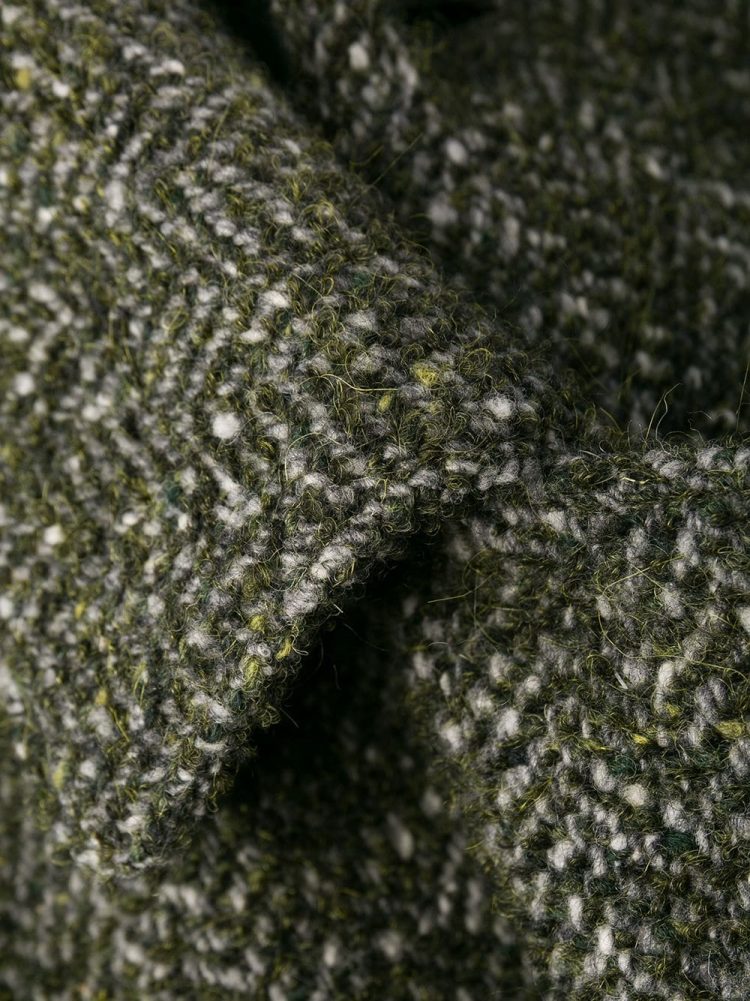 Zoomed-in image of Aspezi's stainless steel collar coat melange fabric