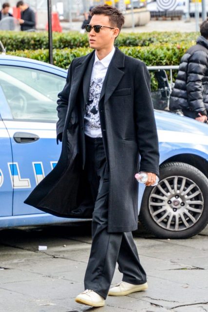 Men's coordinate outfit of gray wool wide pants with sneakers and long coat