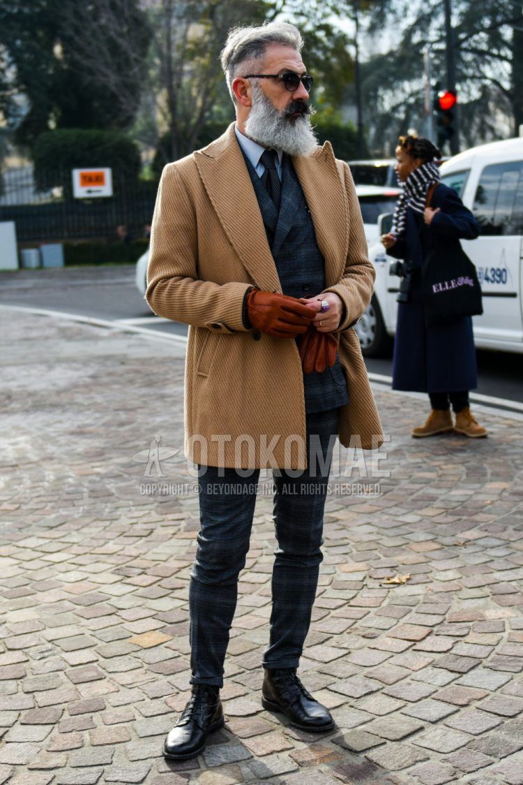 Men's fall/winter outfit with plain sunglasses, plain beige tailored jacket, plain white shirt, black other boots, gray/navy check suit, and black other tie.