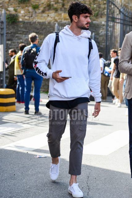 Men's coordinate and outfit with plain white hoodie, plain gray cargo pants, and white low-cut sneakers.