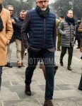 Men's coordinate and outfit with plain glasses, plain navy scarf/stall, plain navy down jacket, dark gray tailored jacket, plain navy cotton pants, and brown chukka boots.