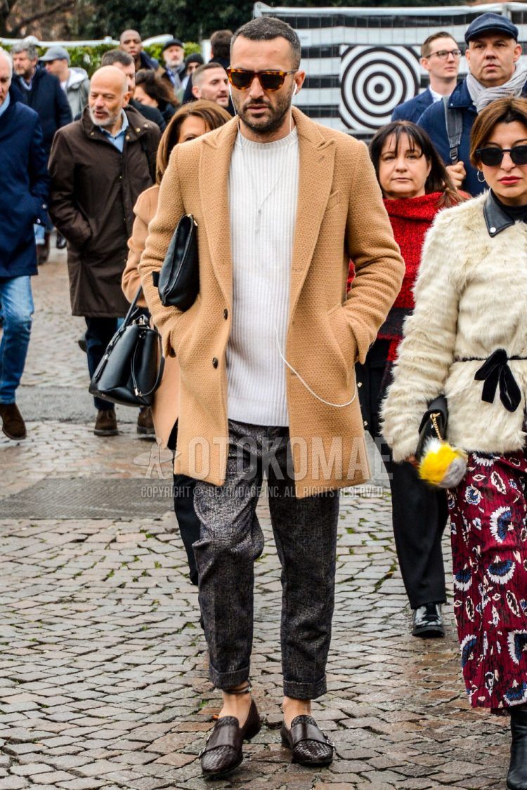 Men's coordinate and outfit with plain sunglasses, plain beige chester coat, plain white sweater, plain gray slacks, and brown loafer leather shoes.