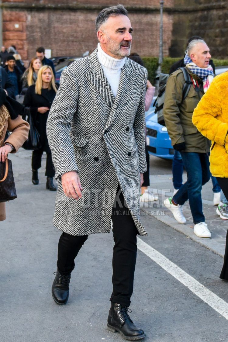 Men's coordinate and outfit with white/black herringbone chester coat, plain white turtleneck knit, plain black cotton pants, and black boots.
