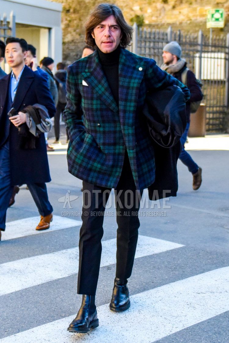 Fall/Spring men's coordinate outfit with tartan green/navy check tailored jacket, plain black turtleneck knit, plain black slacks, and black side gore boots.