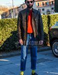 Solid black knit cap, solid sunglasses, solid brown field jacket/hunting jacket, solid orange sweater, solid brown leather belt, solid blue denim/jeans, solid yellow socks, brown coin loafer leather shoes. Men's Codes and Outfits.