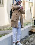 Men's coordinate and outfit with plain glasses, plain brown chester coat, plain white sweater, plain gray sweatpants, and white low-cut sneakers.