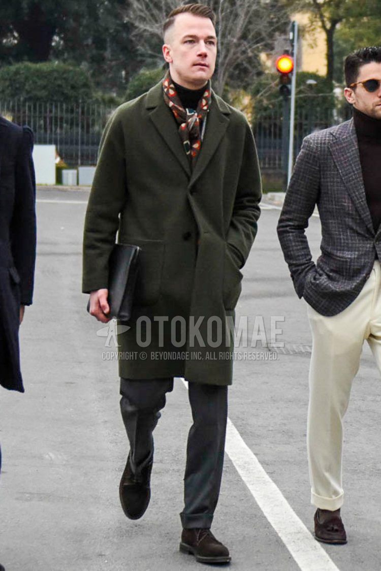 Multicolor stole scarf/stall, olive green solid color chester coat, black solid color turtleneck knit, wool solid color gray slacks, brown suede shoes leather shoes, brown plain toe leather shoes, black solid color clutch bag/second bag/drawl. Men's Codes and Outfits.