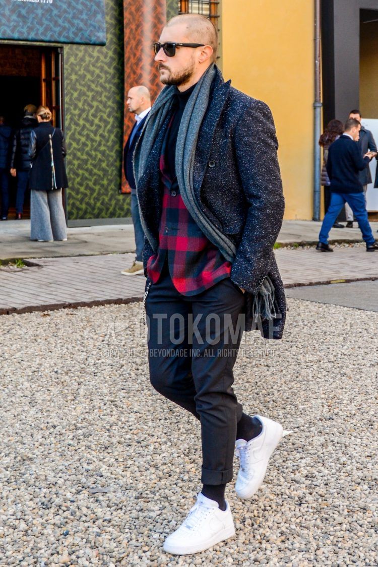 Men's coordinate and outfit with solid color sunglasses, dark gray solid color scarf/stall, red checked tailored jacket, solid color black turtleneck knit, dark gray solid color bottoms, dark gray solid color socks, Nike Air Force 1 white low cut sneakers.
