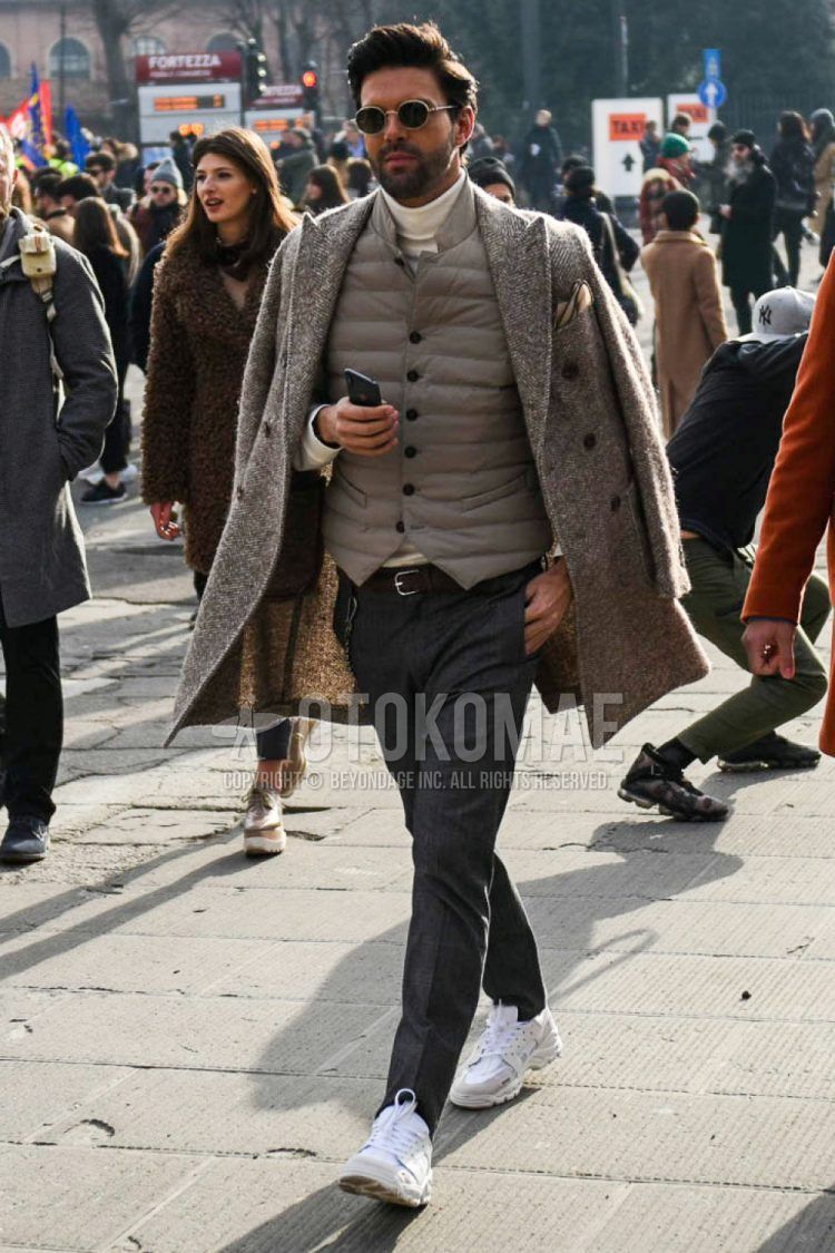 Men's coordinate and outfit with plain sunglasses, plain brown chester coat, plain brown inner down, plain white turtleneck knit, plain brown leather belt, plain gray slacks, and white low-cut sneakers.