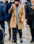 Men's coordinate and outfit with plain knit cap, multi-colored scarf/stall, plain beige chester coat, plain gray sweatpants, plain jogger pants/ribbed pants, and blue low-cut sneakers.