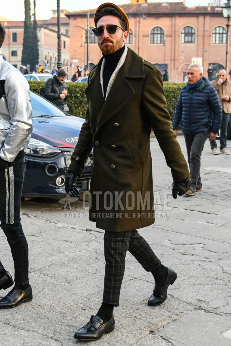 Men's coordinate and outfit with plain sunglasses, plain olive green Ulster coat, plain white cardigan, plain black turtleneck knit, dark gray checked slacks, plain black socks, and black tassel loafer leather shoes.