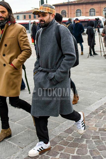Men's coordinate and outfit with Burberry beige check cap, plain gray belted coat, plain gray stainless steel collar coat, plain black slacks, Adidas white low-cut sneakers, and plain black backpack.