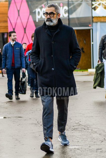 Winter men's coordinate and outfit with plain black glasses, plain black stainless steel collar coat, plain black turtleneck knit, plain gray slacks, and Adidas Iniki Runner gray low-cut sneakers.